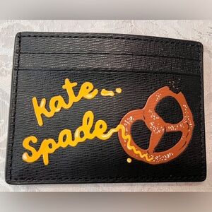 Kate Spade Big Apple Pretzel Small Slim Card Holder in black patent leather NWT